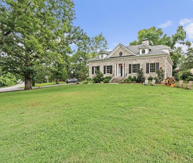 4220 Kirtland Rd, Nashville, TN 37215 - view of front of home with a front yard, a chimney, and brick siding
