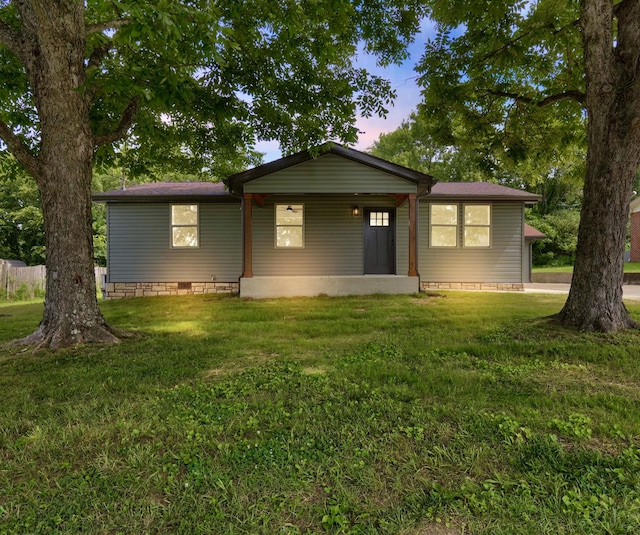 306 Forrest St, Watertown, TN 37184 - back of house with crawl space, a lawn, and a carport