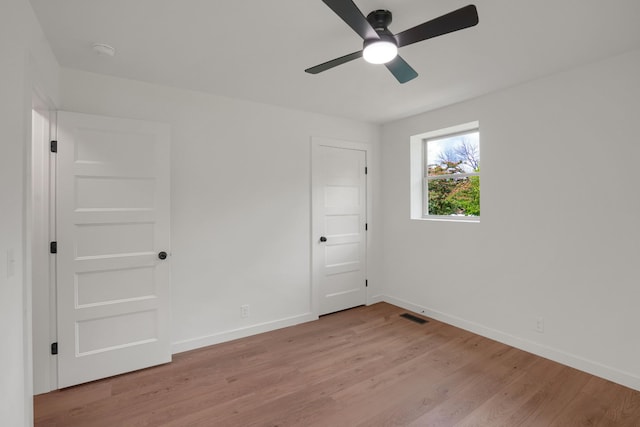 306 Forrest St, Watertown, TN 37184 - unfurnished bedroom with light wood-type flooring and ceiling fan