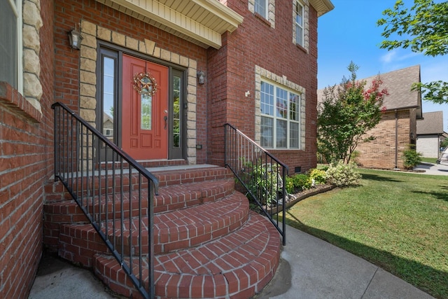 312 Retriever Ct, Clarksville, TN 37043 - doorway to property featuring brick siding and a yard