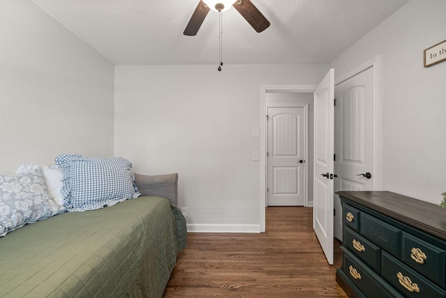236 Slayden Cir, Clarksville, TN 37040 - bedroom featuring wood finished floors, ceiling fan, and a textured ceiling