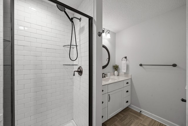 236 Slayden Cir, Clarksville, TN 37040 - bathroom with a shower stall, a textured ceiling, and vanity