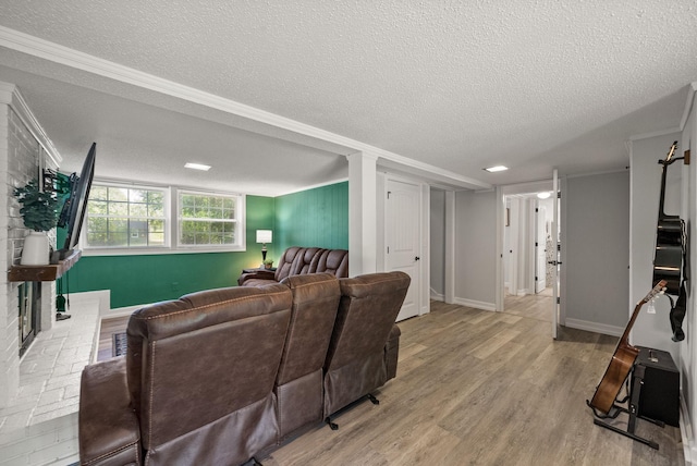 236 Slayden Cir, Clarksville, TN 37040 - living room featuring a textured ceiling, wood finished floors, and crown molding