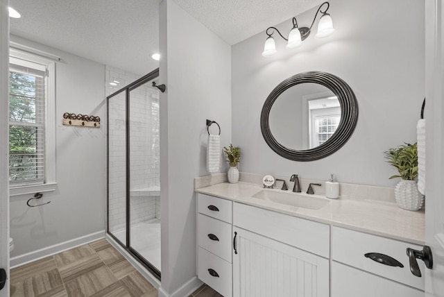 236 Slayden Cir, Clarksville, TN 37040 - full bath featuring a stall shower, vanity, and a textured ceiling