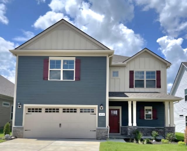 3620 Stormy Ln, Rockvale, TN 37153 - craftsman-style house featuring board and batten siding, driveway, stone siding, an attached garage, and a porch