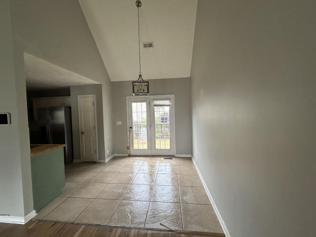 3421 Foxrun Ln, Clarksville, TN 37042 - foyer featuring high vaulted ceiling and baseboards