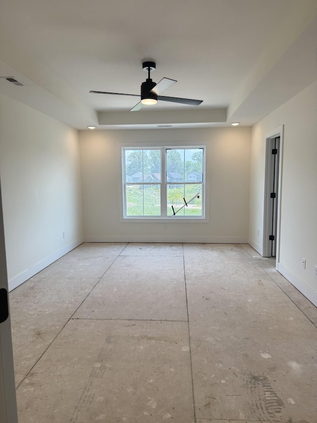 317 Wesson Dr, Clarksville, TN 37043 - unfurnished room featuring a raised ceiling and a ceiling fan