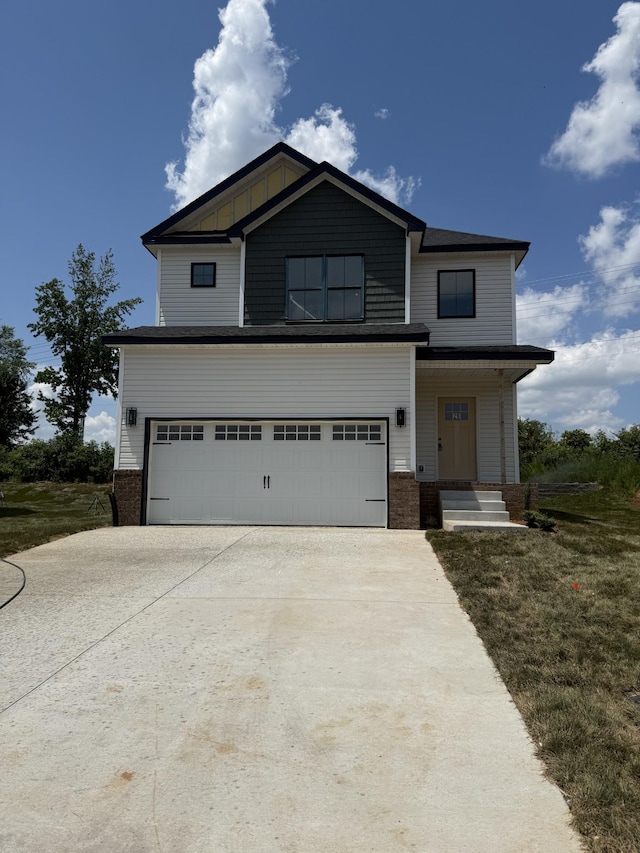 317 Wesson Dr, Clarksville, TN 37043 - craftsman inspired home with driveway, a garage, and brick siding