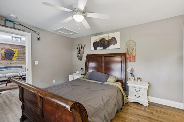 813 Lonnie St, Columbia, TN 38401 - bedroom with attic access, wood finished floors, and ceiling fan