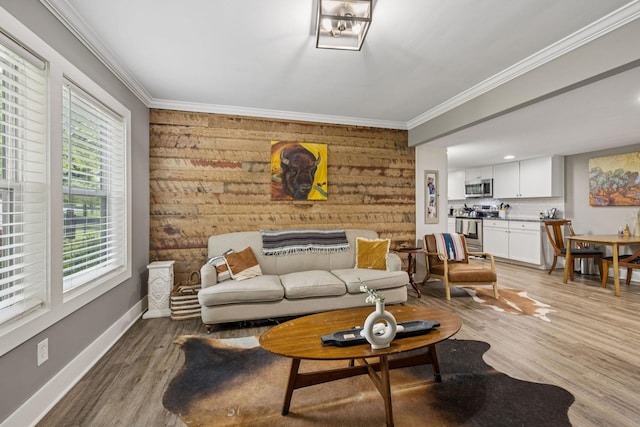 813 Lonnie St, Columbia, TN 38401 - living area with healthy amount of natural light, crown molding, and light wood-style flooring