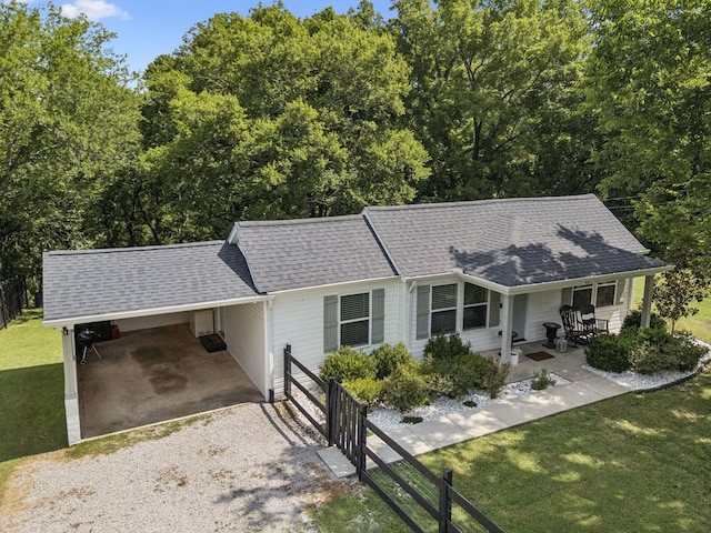 813 Lonnie St, Columbia, TN 38401 - ranch-style home with an attached carport, driveway, covered porch, and a shingled roof
