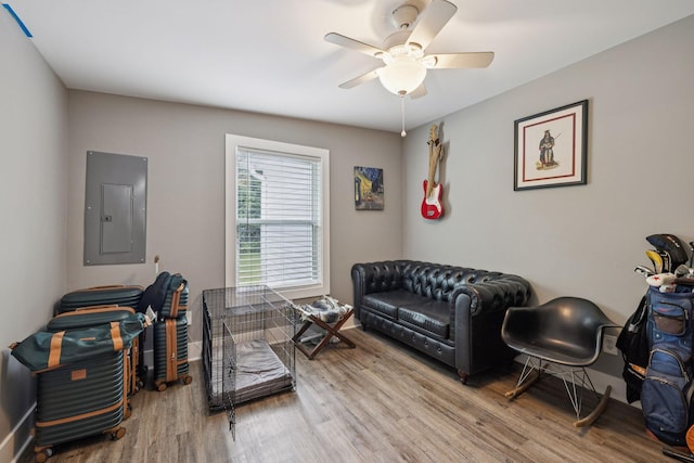 813 Lonnie St, Columbia, TN 38401 - living room with electric panel, wood finished floors, and a ceiling fan