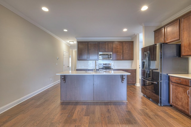 213 Vintage Way, Lebanon, TN 37087 - kitchen with stainless steel appliances, ornamental molding, light countertops, tasteful backsplash, and dark wood-style floors