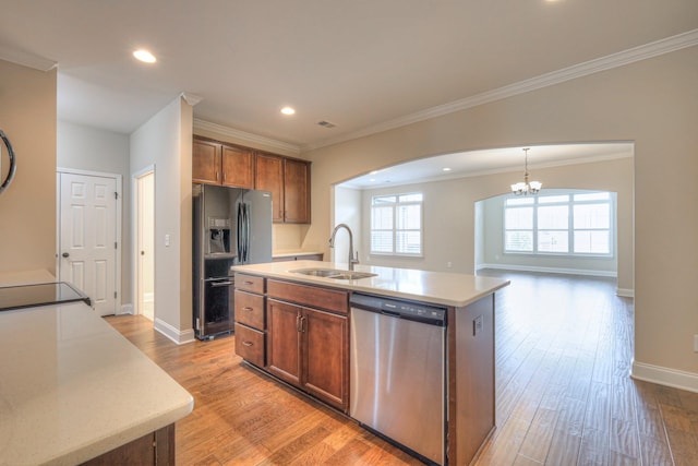 213 Vintage Way, Lebanon, TN 37087 - kitchen with stainless steel dishwasher, black refrigerator with ice dispenser, arched walkways, light countertops, and recessed lighting