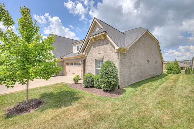 213 Vintage Way, Lebanon, TN 37087 - view of property exterior with brick siding, an attached garage, concrete driveway, roof with shingles, and a yard