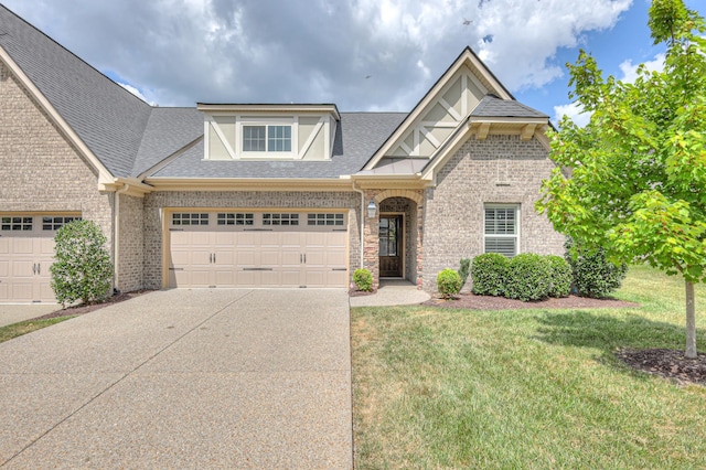 213 Vintage Way, Lebanon, TN 37087 - view of front of home featuring concrete driveway, a garage, roof with shingles, and a front yard