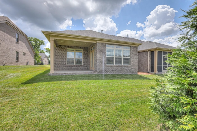 213 Vintage Way, Lebanon, TN 37087 - back of property with brick siding, a patio area, a yard, and a shingled roof