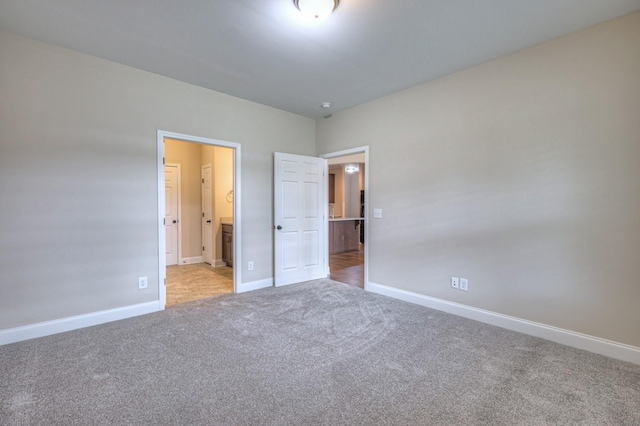 213 Vintage Way, Lebanon, TN 37087 - unfurnished bedroom with light colored carpet and connected bathroom