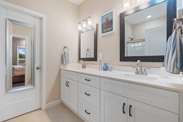 204 Locust St, Mc Ewen, TN 37101 - ensuite bathroom with double vanity, tile patterned flooring, and a shower with door