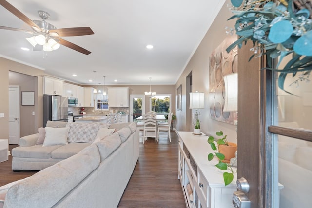 204 Locust St, Mc Ewen, TN 37101 - living area featuring ornamental molding, dark wood finished floors, recessed lighting, a ceiling fan, and a chandelier