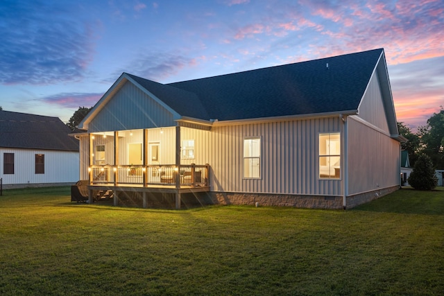 204 Locust St, Mc Ewen, TN 37101 - rear view of property with a lawn and a wooden deck