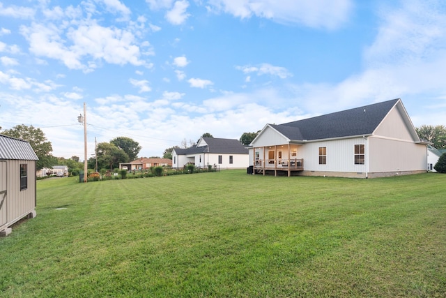 204 Locust St, Mc Ewen, TN 37101 - view of grassy yard with a wooden deck