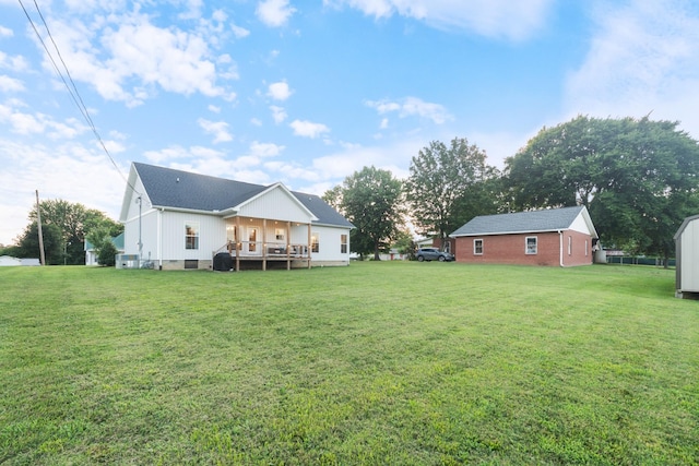 204 Locust St, Mc Ewen, TN 37101 - view of grassy yard with a deck