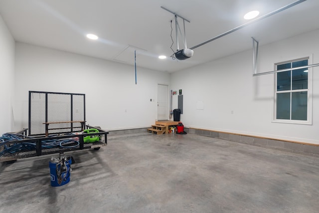 204 Locust St, Mc Ewen, TN 37101 - garage with a garage door opener and recessed lighting