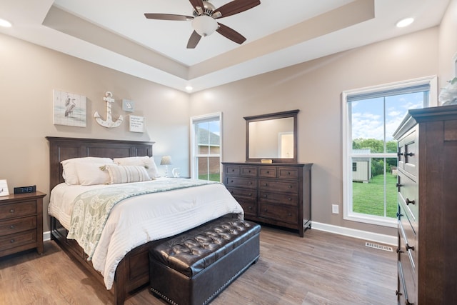 204 Locust St, Mc Ewen, TN 37101 - bedroom featuring a tray ceiling, wood finished floors, recessed lighting, and ceiling fan