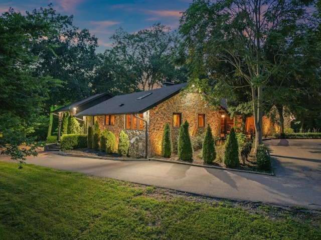 3360 Sweeney Hollow Rd, Franklin, TN 37064 - view of front of property with stone siding and a yard