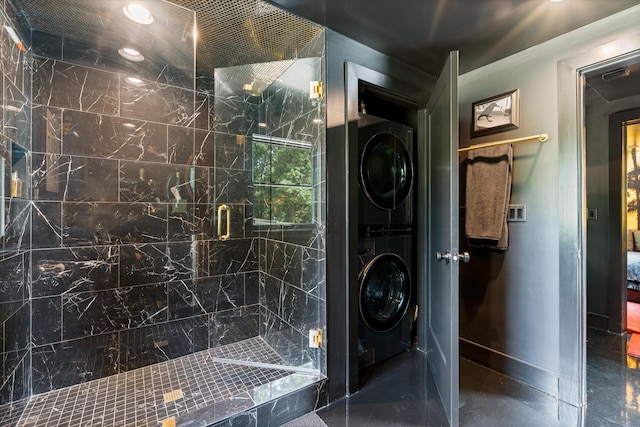 3360 Sweeney Hollow Rd, Franklin, TN 37064 - full bath with stacked washer and clothes dryer and a marble finish shower