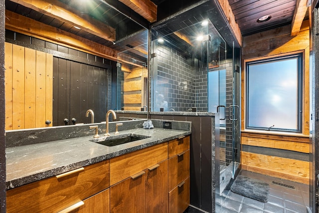 3360 Sweeney Hollow Rd, Franklin, TN 37064 - kitchen with wooden walls, dark stone countertops, wooden ceiling, and brown cabinets