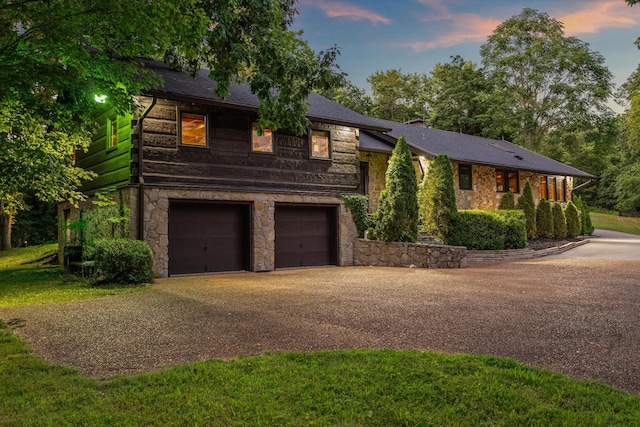 3360 Sweeney Hollow Rd, Franklin, TN 37064 - view of front of house featuring stone siding, concrete driveway, a garage, and a shingled roof