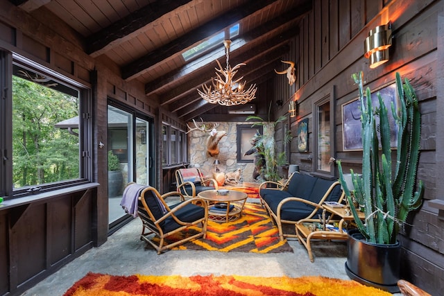 3360 Sweeney Hollow Rd, Franklin, TN 37064 - sunroom / solarium with a chandelier, wooden ceiling, and concrete flooring