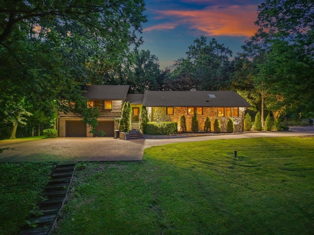 3360 Sweeney Hollow Rd, Franklin, TN 37064 - view of front of home with driveway, stone siding, a front lawn, a garage, and a chimney