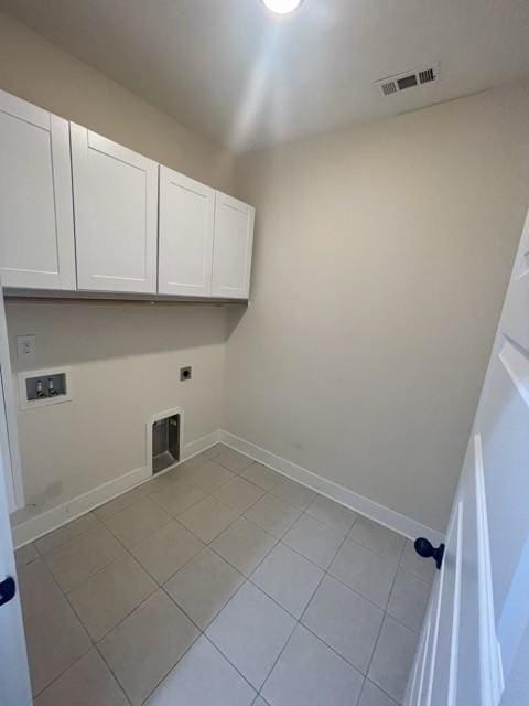 2412 Bullrush Ln, Murfreesboro, TN 37128 - washroom with cabinet space, hookup for a washing machine, light tile patterned floors, and electric dryer hookup