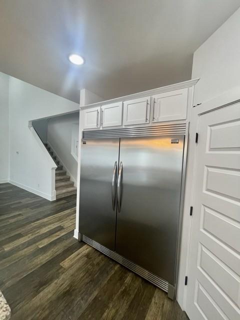 2412 Bullrush Ln, Murfreesboro, TN 37128 - kitchen with stainless steel built in fridge, white cabinetry, dark wood-style flooring, and recessed lighting