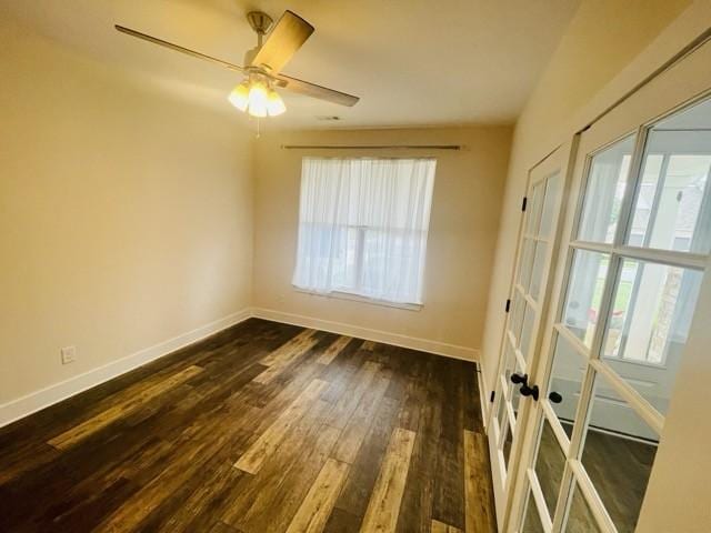 2412 Bullrush Ln, Murfreesboro, TN 37128 - unfurnished room featuring dark wood-type flooring, french doors, and ceiling fan