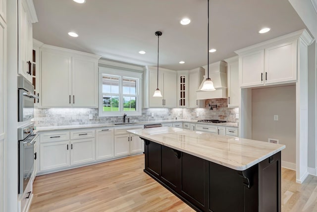 3058 Henley Way, Spring Hill, TN 37174 - kitchen featuring premium range hood, stainless steel appliances, white cabinetry, decorative backsplash, and recessed lighting