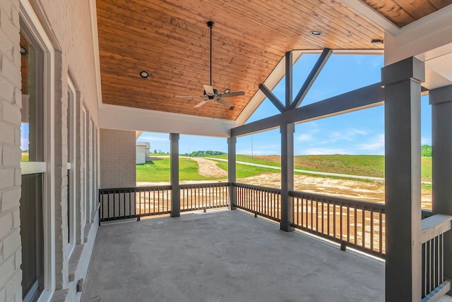 3058 Henley Way, Spring Hill, TN 37174 - unfurnished sunroom featuring a ceiling fan, lofted ceiling, and view of golf course