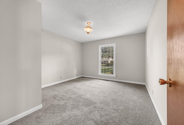 207 Short St, Clarksville, TN 37042 - empty room with carpet and a textured ceiling