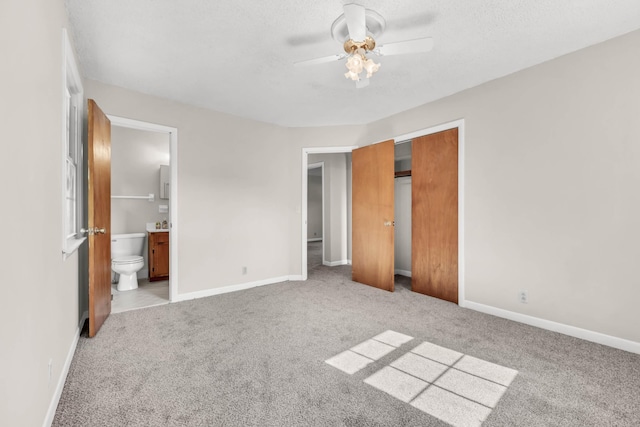 207 Short St, Clarksville, TN 37042 - unfurnished bedroom featuring carpet flooring, a closet, ensuite bathroom, and a ceiling fan