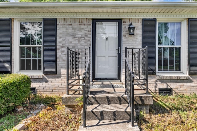 207 Short St, Clarksville, TN 37042 - view of exterior entry featuring crawl space and brick siding