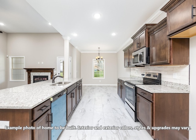 914 Vendue Ave, Clarksville, TN 37042 - kitchen featuring appliances with stainless steel finishes, light marble finish flooring, light stone counters, tasteful backsplash, and dark brown cabinetry