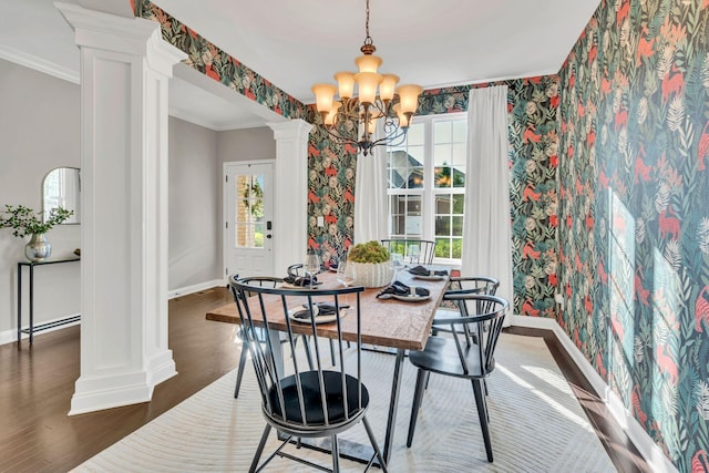 412 Warren Hill Dr, Mount Juliet, TN 37122 - dining room with decorative columns, a chandelier, healthy amount of natural light, ornamental molding, and wallpapered walls