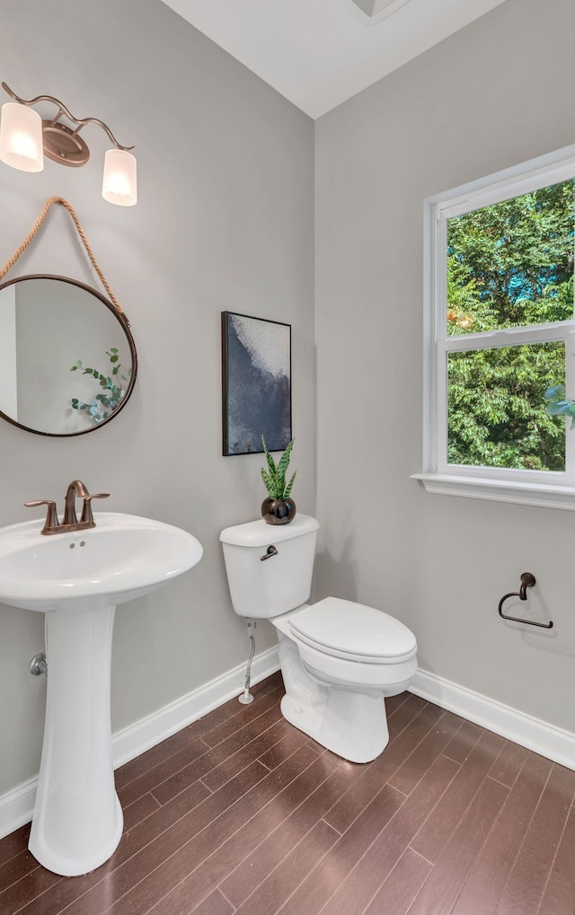 412 Warren Hill Dr, Mount Juliet, TN 37122 - half bathroom featuring wood finished floors and baseboards