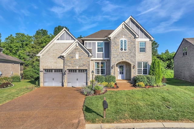 412 Warren Hill Dr, Mount Juliet, TN 37122 - craftsman-style house featuring stone siding, driveway, board and batten siding, a front lawn, and a garage