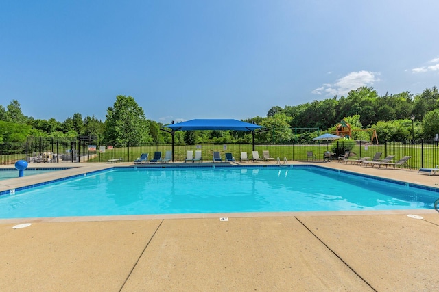 412 Warren Hill Dr, Mount Juliet, TN 37122 - community pool featuring a patio area and view of wooded area