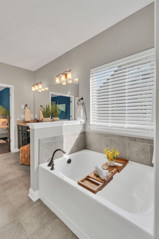 412 Warren Hill Dr, Mount Juliet, TN 37122 - bathroom featuring a bath, vanity, tile patterned flooring, and ensuite bathroom