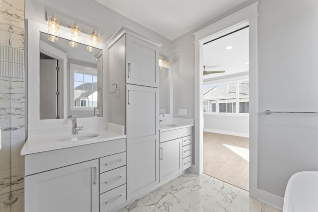 316 Campfire Ct, Winchester, TN 37398 - bathroom with marble finish flooring, vanity, and a freestanding tub